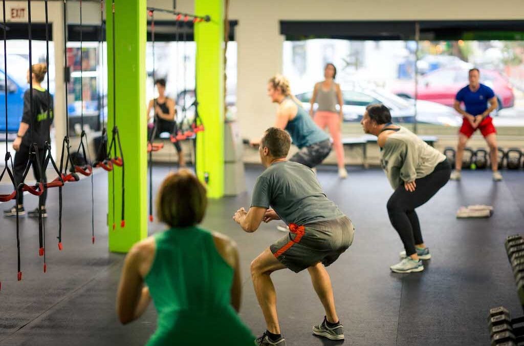 What are Three Benefits of Working out with a Crowd?